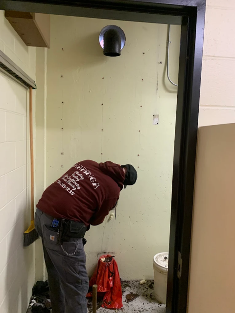 Haringa Services technician at work on a service call